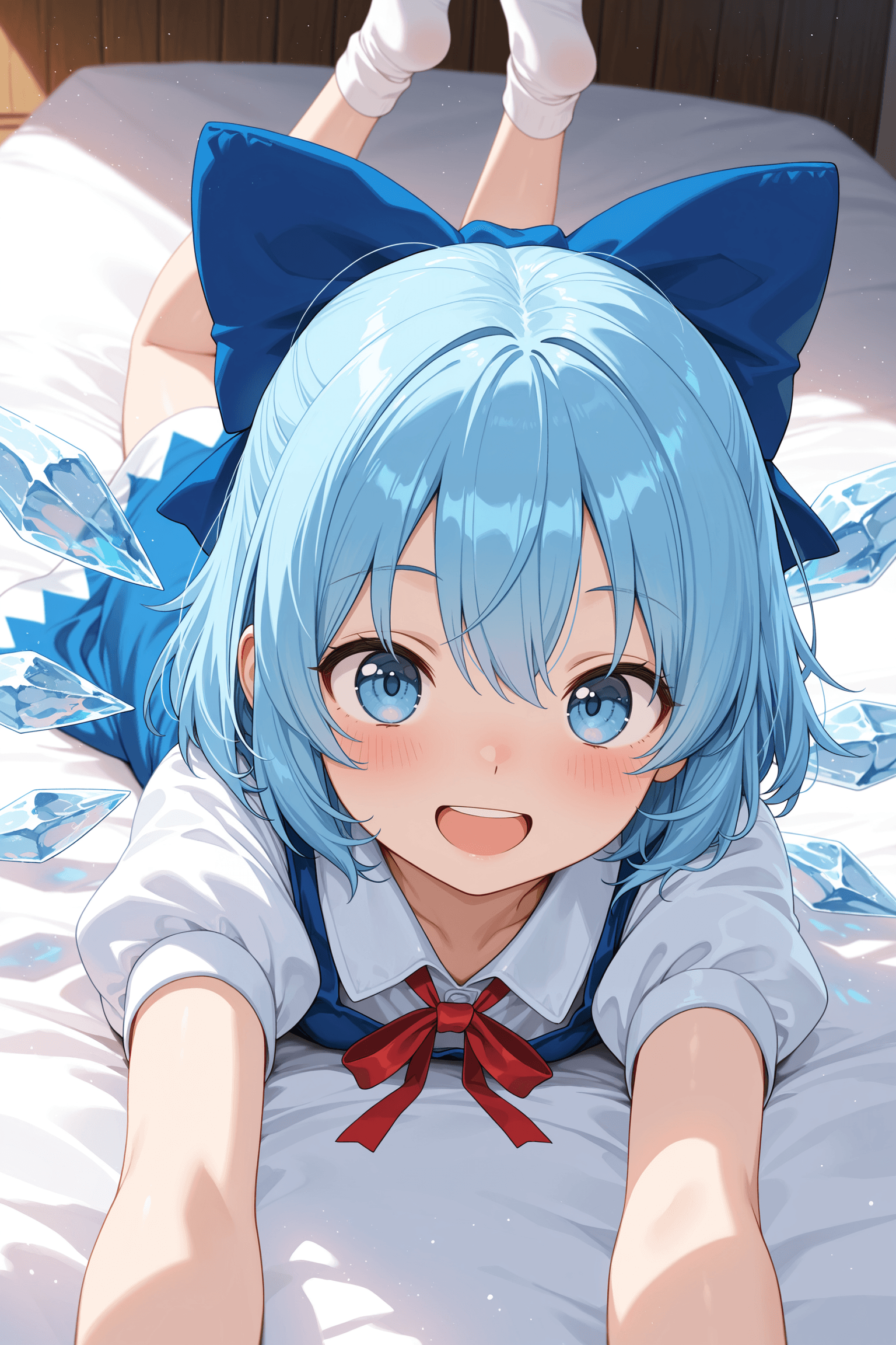 1girl, solo, looking at viewer, blush, smile, short hair, open mouth, blue eyes, dress, bow, blue hair, short sleeves, :d, hair bow, lying, wings, socks, puffy sleeves, blue dress, blue bow, no shoes, on stomach, ice, ice wings, cirno